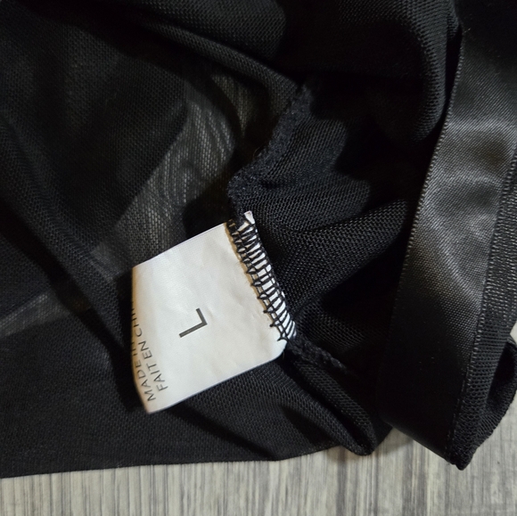 Avid Love lingerie black lace with peek through slit in the back. - Picture 3 of 3